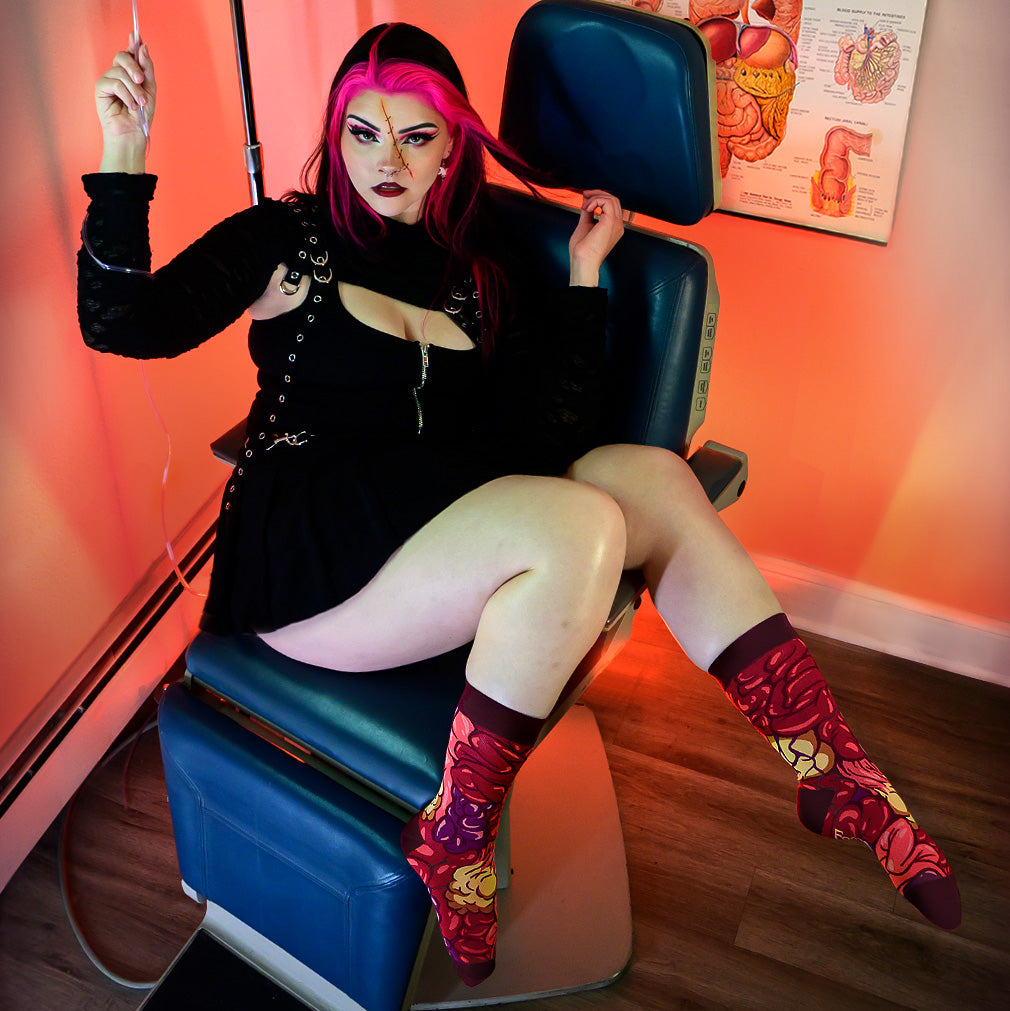 FootClothes Gut Feeling Crew Socks on Tatum Model in Medical Chair
